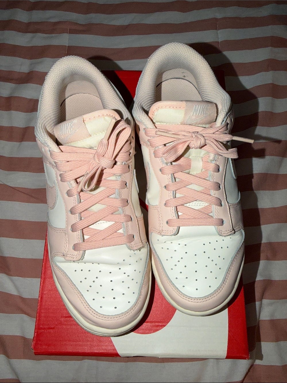 Nike Women’s Dunk Low Sneakers in Sail Orange Pearl